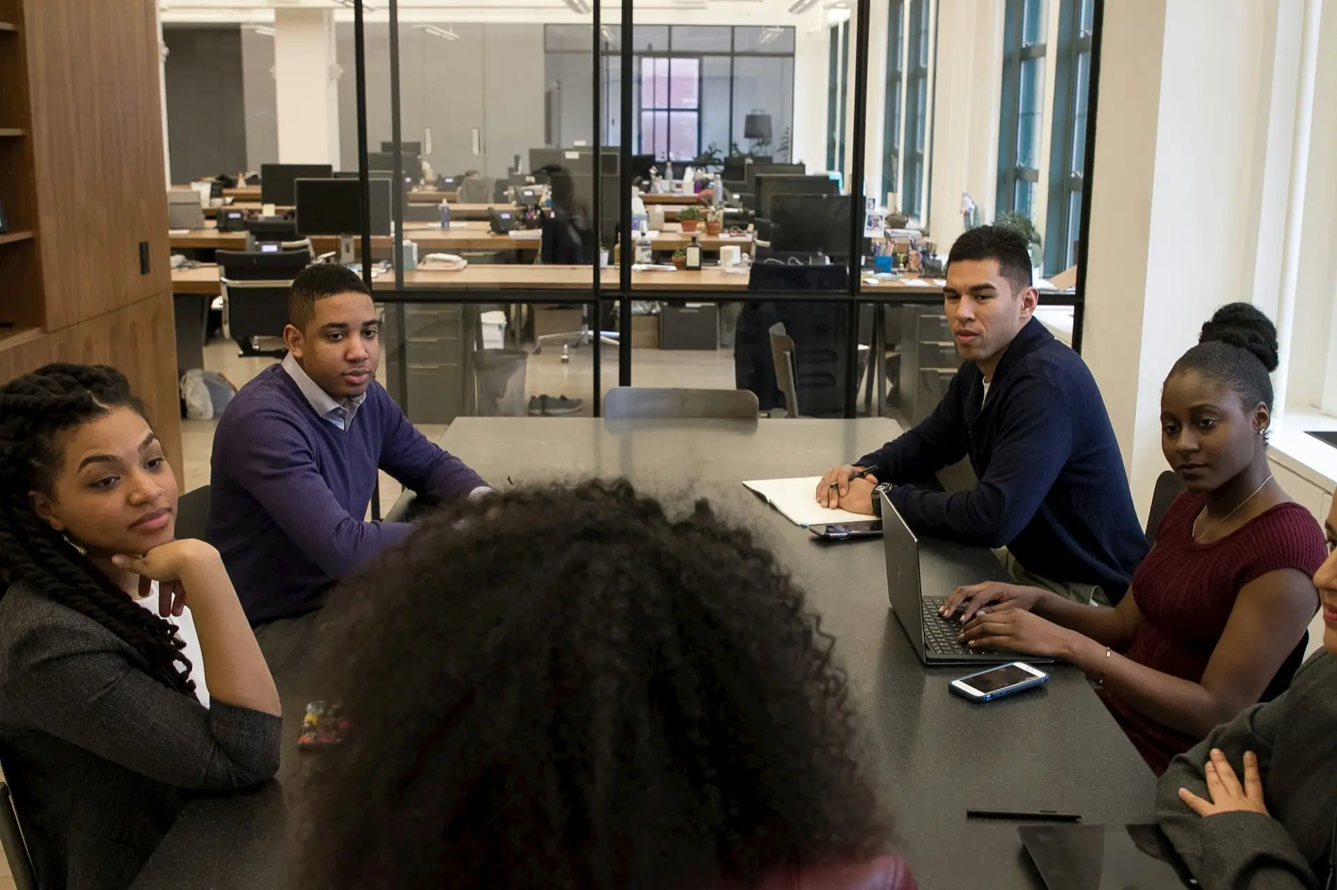 Our team collaborating in an agile, fast-moving workspace